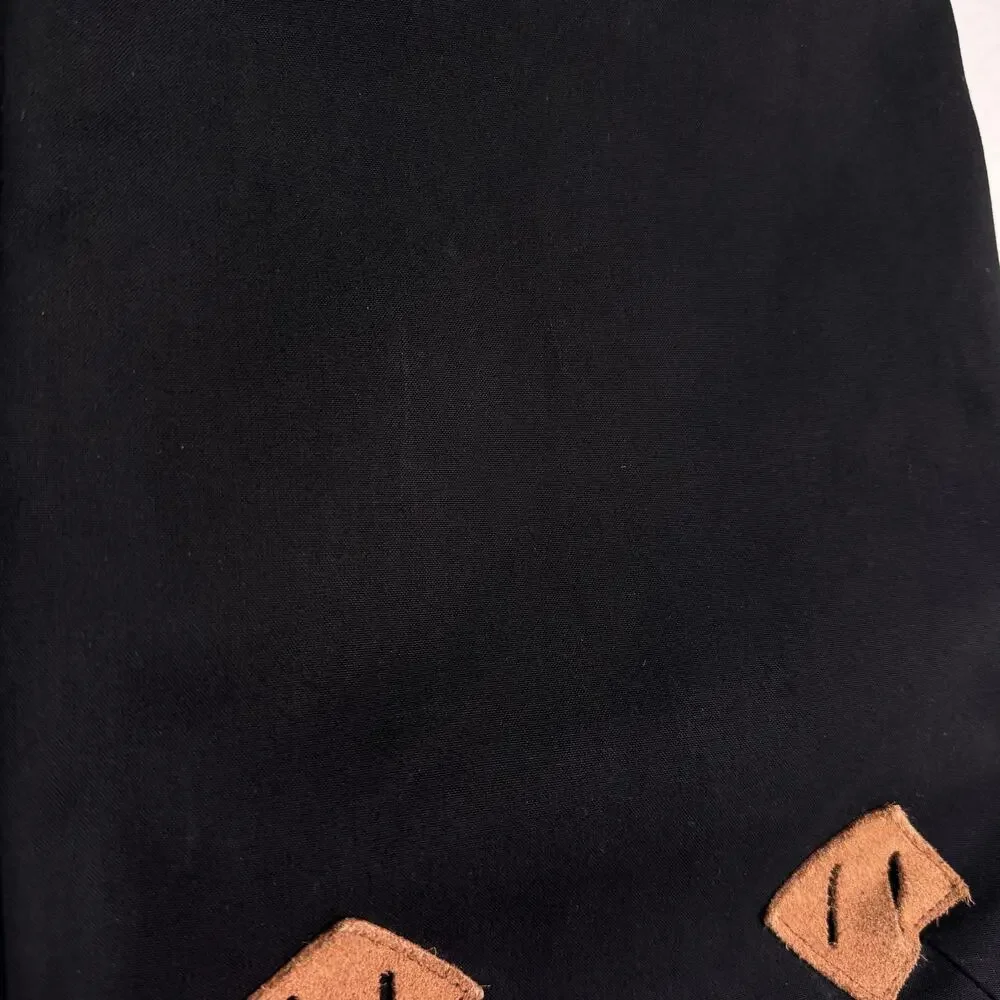 cotopaxi Black Backpack with Brown Accents